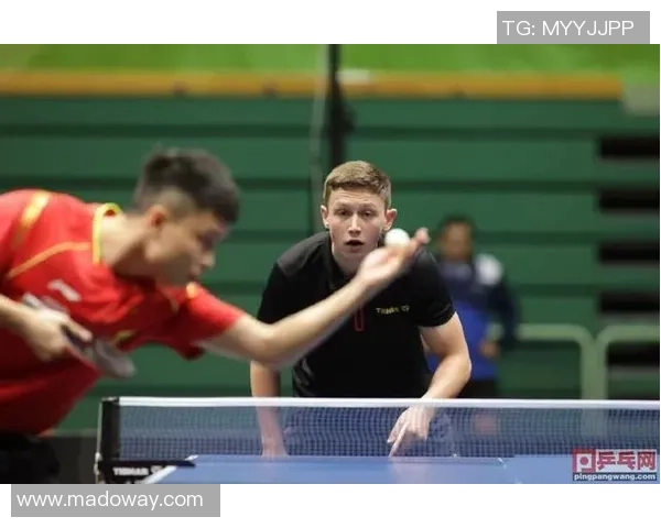 周启豪与法尔克激战正酣谁能在乒乓赛场上笑到最后